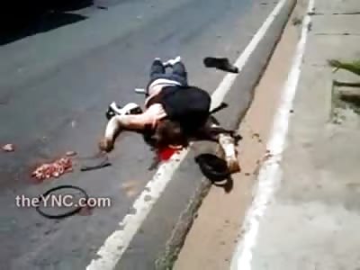 If you Try and Answer Your Cell Phone While Riding a Motorcycle.....Your brains might End up Next to you on the Road