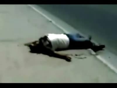 Man with Face Blown Off still Moves his Arm