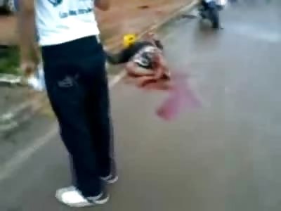 Screaming Man rolling in the Street is in a World of Pain