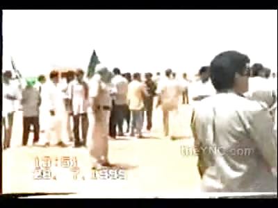 Ruthless Public Hanging of Older man in front of Excited Crowd