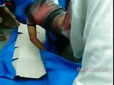 Dragging the Bloody Mess of a Man out of the Vehicle