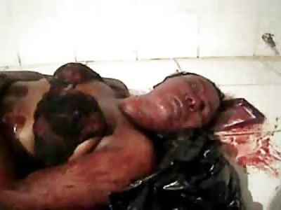 Short Sneaky Video of Female Murdered laid out on the Morgue Table