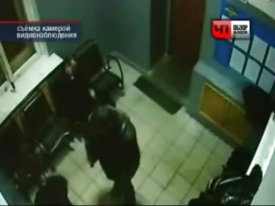 Man gets Brutal Beating in Waiting Room while another Man chats on his Cell Phone