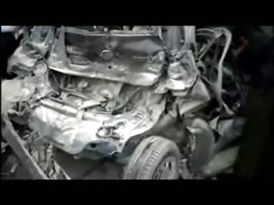 Lucky Man Trapped in Car When His Fiat is Sandwiched by Two Huge Trucks