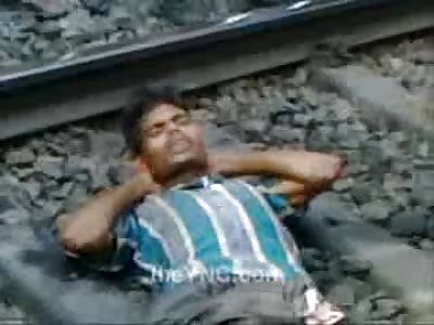 TOTAL SHOCK: Mans Legs Severed by Train Consciously Talking to Onlookers
