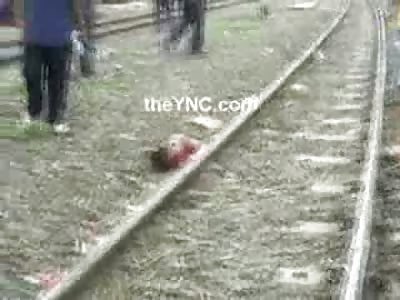 Punk Kid with a Punk Haircut dies in a Glorious Fashion chasing Trains 