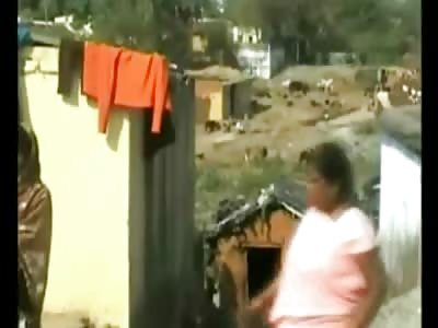 Starving Boy in India Drinks Milk from a Dog