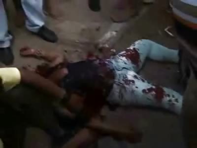 Crying Man comforts his Dead Wife in a Bloody Mess