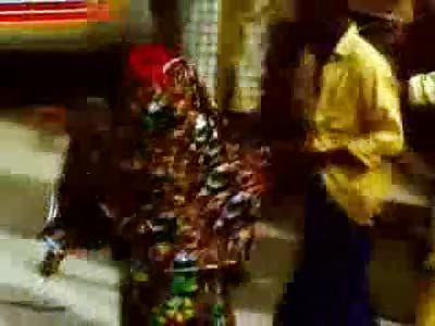 Woman being Stripped before being Stoned