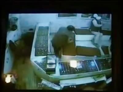 Shop Owner Killed in Hail of Bullets Protecting his Store.....