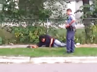 Black Man pretending to Vomit is Kicked in the Face and Violently Arrested as the Whole Neighborhood yells at the Officers 