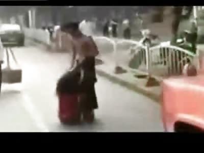 Bizarre Couple Fight in the Middle of the Street...