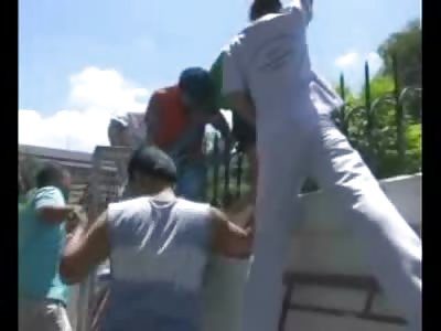 Painter has Accident,,spills Paint all over his Face..Oh and Impales Himself on a Spiked Iron Fence