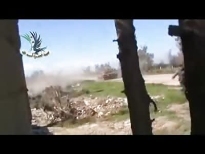 FSA Fighter throws a Grenade down a Tank Barrel 