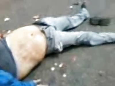 New Gore: Head Trampled by Truck Dead Man lies in a Mess on the Street