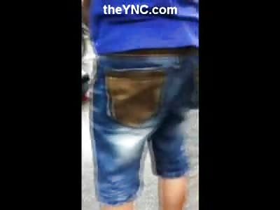 Trying to Pick the Dead Boy off the Ground Leaving Some of Him