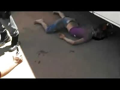 Biker is Left Mangled under Truck and his Face Smashed