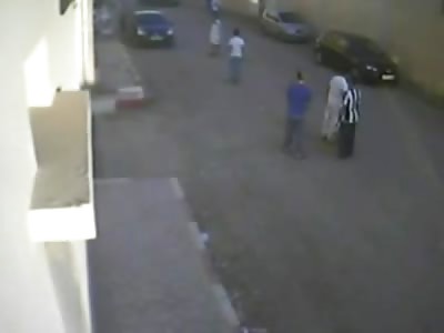 Maniac charges Man in the Street with his Car sending Flipping over the Hood