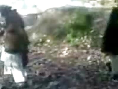 Taliban in a Frenzy: One Man is Executed with AK....his Friend gets it Worse as he is Stoned to Death by Crowd....