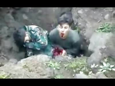 Brutal Execution,,2 Men Sot in the Head have Dirt Shoveled over Them by Killers
