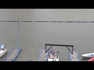 Awesome Video Shows Hero Save Dog from Drowning in Russia During Crazy Rain Storm