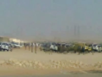 New Video of Executioner in White Beheading a Criminal with a Sword (Zoom View at End of Video) 