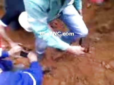 Kid is Buried Alive While at Work...Rescuers Give Mouth to Mouth with only His Head Exposed