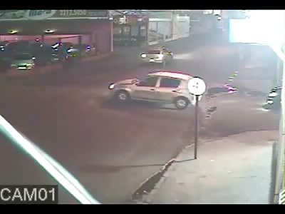 Amazing Video shows Biker flipping in Mid-Air lands in Parking Lot...Police Fire Bullets at Driver of the Car and dont see the Biker