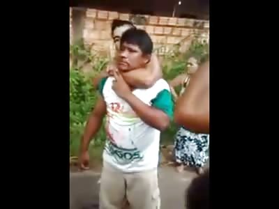 Accused Rapist about to be Beaten to Death is Saved by man with a Gun