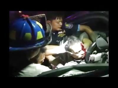 Dead Couple Removed From Vehicle Following Accident