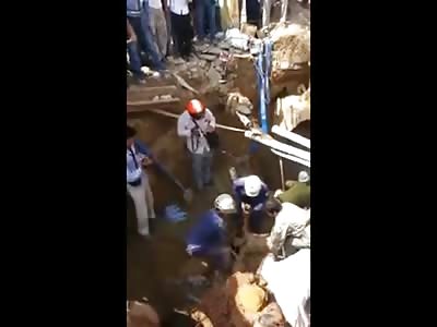 Very Bizarre Video Shows a Rescue Attempt of a Man and then Excessive Shaking of Him Upside Down? ...WTF?