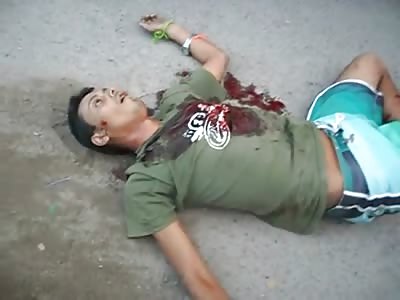 Man Shot Agonizes and Dies on the Street While Folks Record