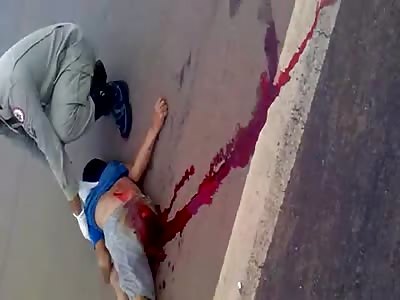 Boy was Killed hit by a Car lies Just Dead in the Street 