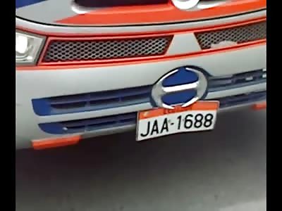 Old Mans Lays Peacefully Dead under the Wheel of a Truck
