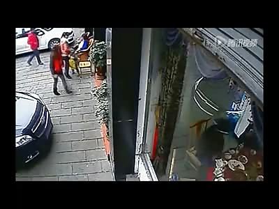 Mother Crushed against Wall Saving her Little Girl from Being Crushed to Death by Idiotic Driver 