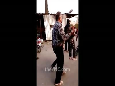 Man Holding a Little Girl with Head Exploded after Russian Airstrike in Aleppo