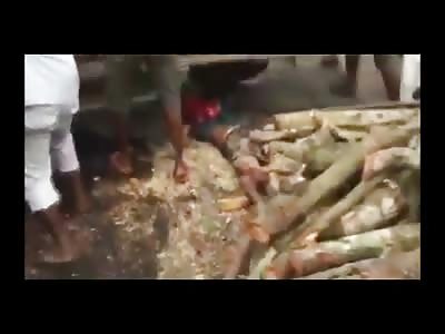 Group Lift a Heavy Truck off of a Very Dead Man 