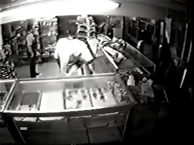 Two cops shot in store.