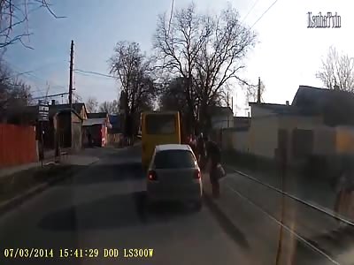 A car gets free paint job by knocking over a kid 