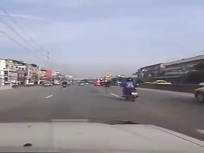 Ostrich is running on the road.