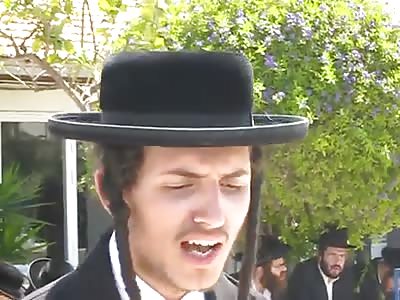 Jews Hate Woman - Swarm, Attack and Spit on Non-jewish Female Reporter