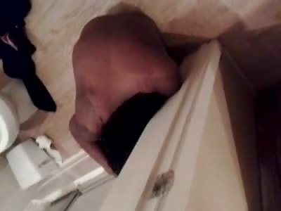 Naked Drunk Black Girl puts her Arm in Toilet 