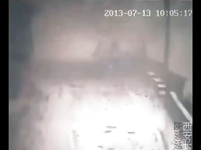 Landslide buries cars on road