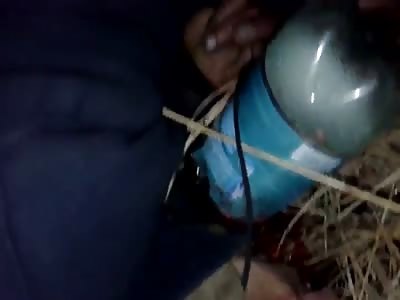 Dead Ukrainian soldiers on duty with his throat slit