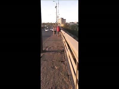 The girl was thrown off a bridge