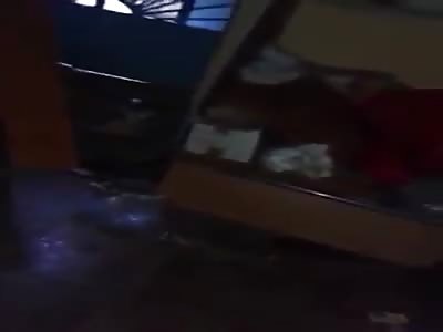 Drunk and naked girl-seller after a night of work in the shop