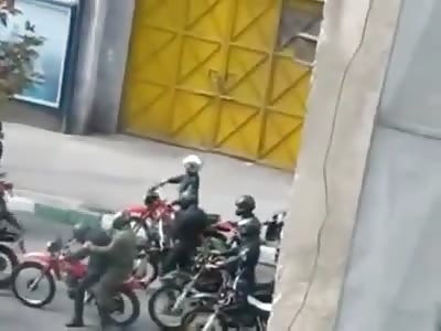 Assault brutal attack on a female police in street clashes in 2010]IRAN