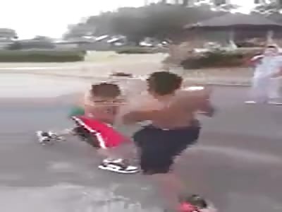 Dude Gets Punched into a Full Blown Seizure on the Road