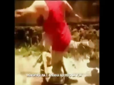 Teenager Robber Beaten THE F* Up By Angry Locals