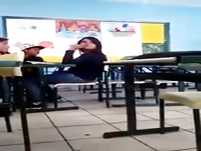 *BRAZIL* Schoolgirl receives a flying sidekick to the back of the head and dragged in middle of the classroom